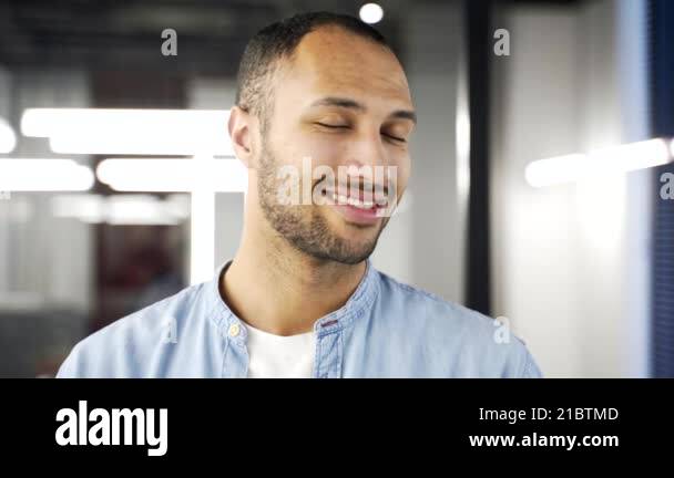 Portrait Of Happy African American Businessman Standing In Business