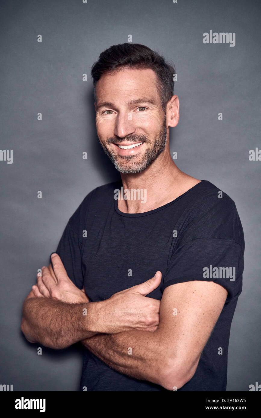 Portrait Of Mature Man Crossed Arms Stock Photo Alamy