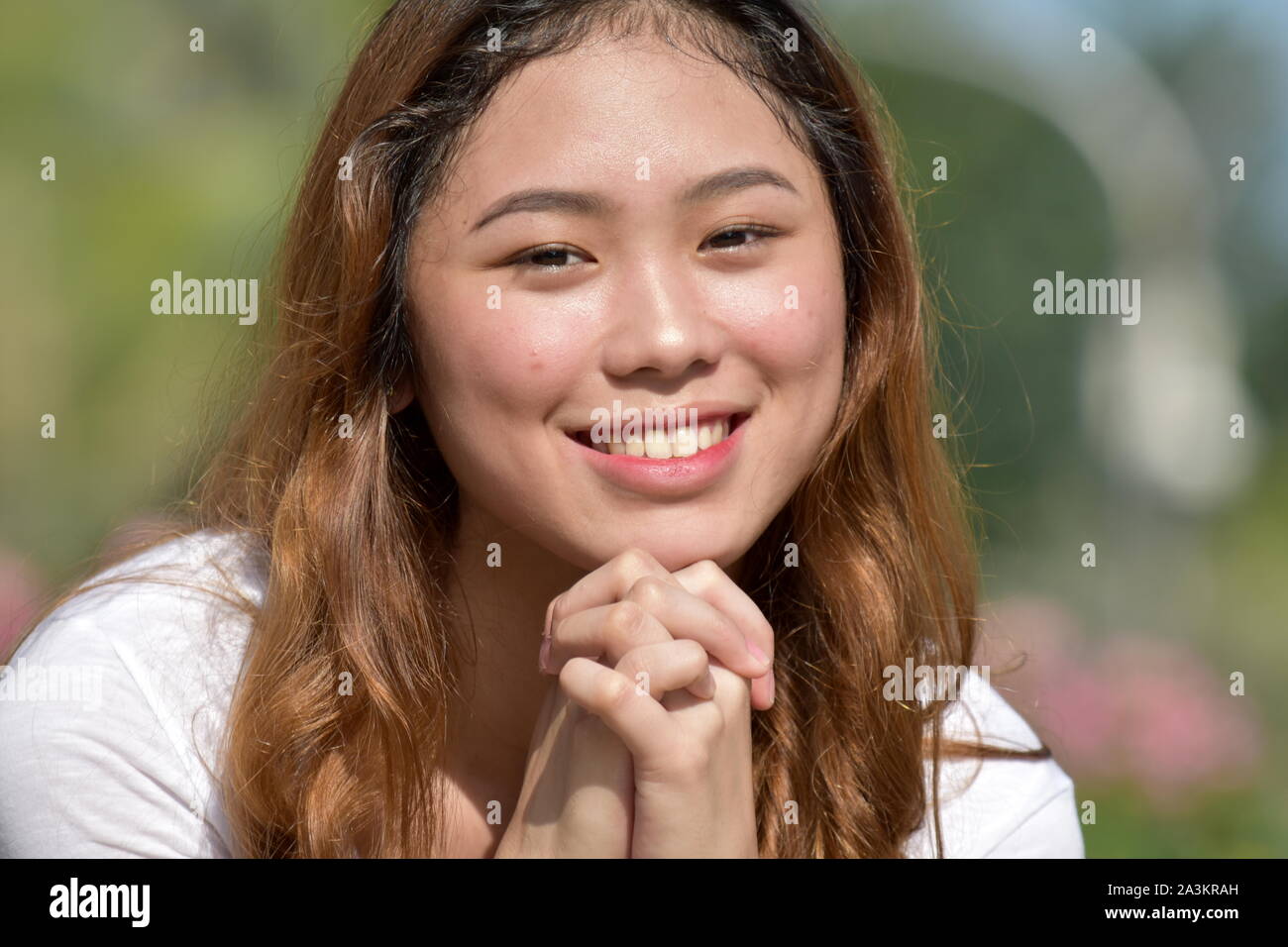 An Attractive Adult Female Praying Stock Photo Alamy