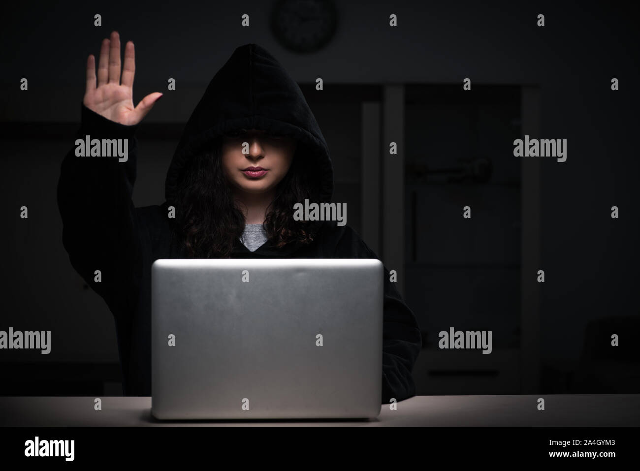 The Female Hacker Hacking Security Firewall Late In Office Stock Photo