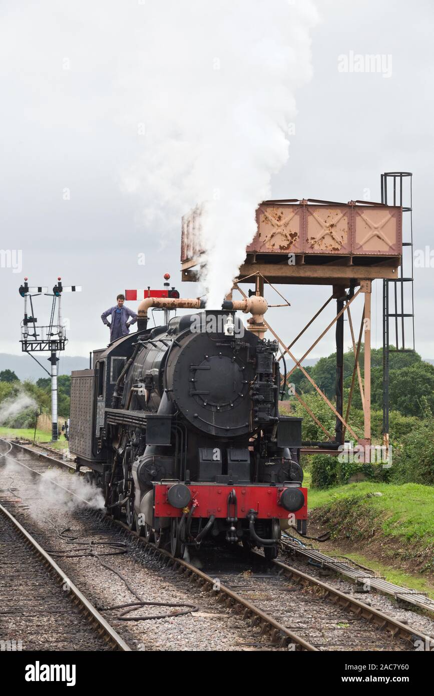 Steam Locomotive 6046 USATC Train At Bishop Lydeard Station In