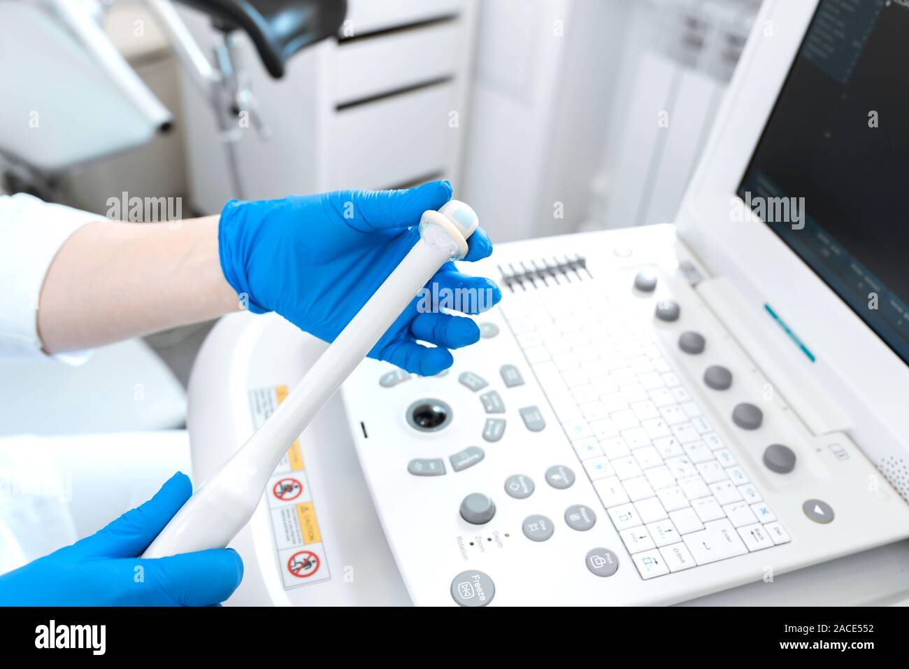 Gynecologist Doctor Prepares An Ultrasound Machine For The Diagnosis Of