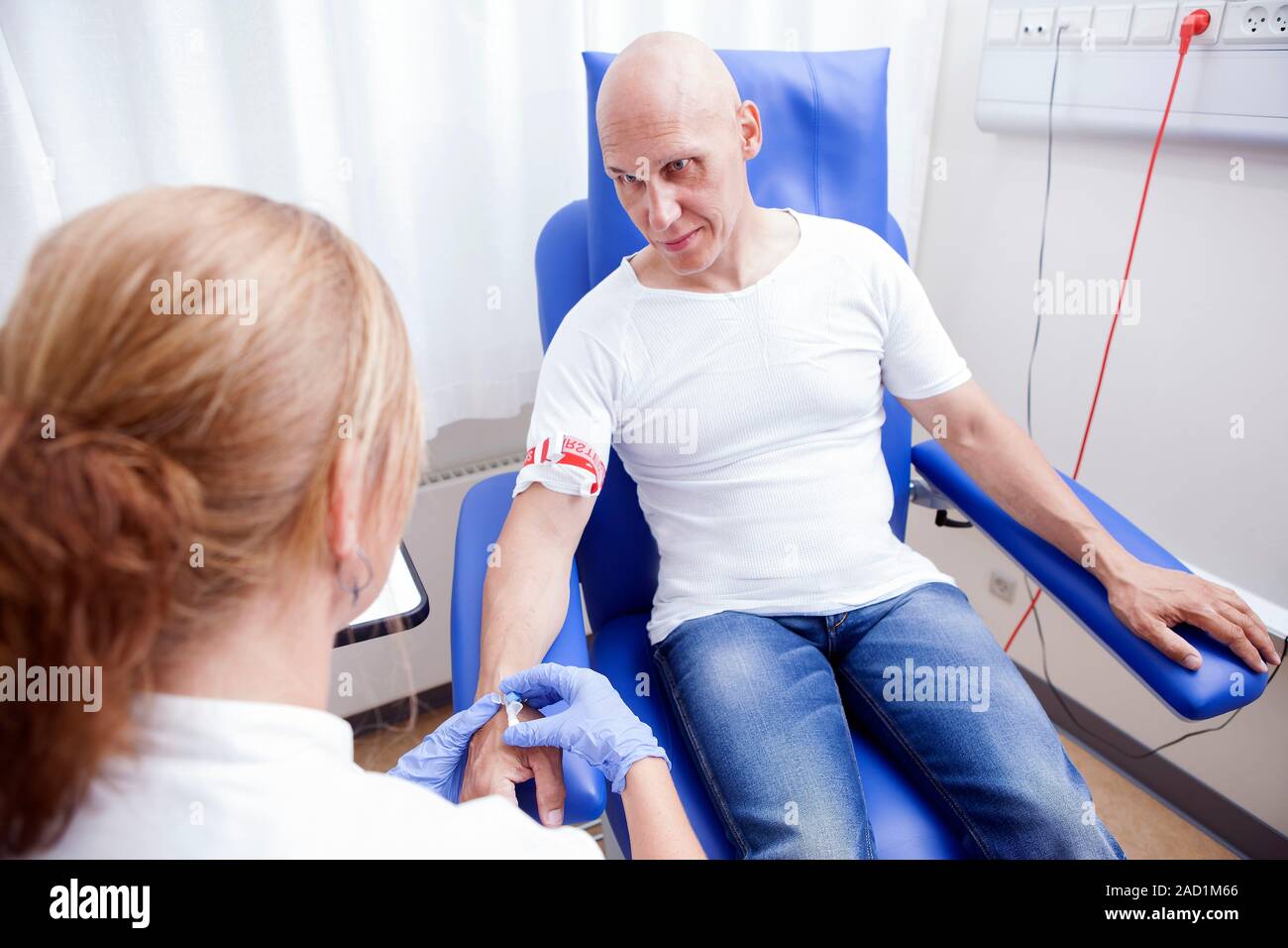 Chemotherapy Treatment Nurse Preparing The IV Intravenous Drip For A