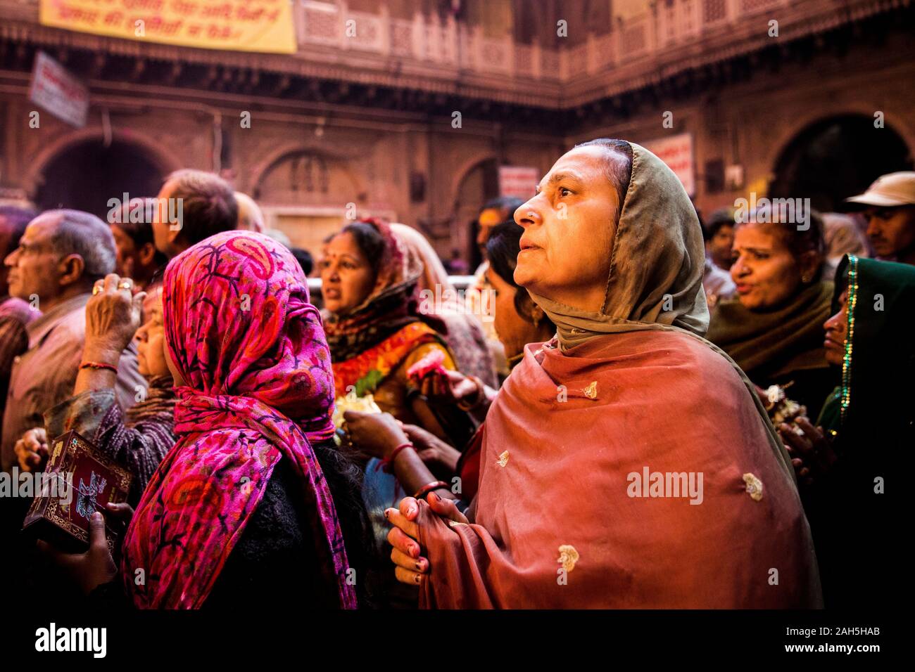 Woman Praying Inside Bankey Bihari Temple During Holi Celebrations