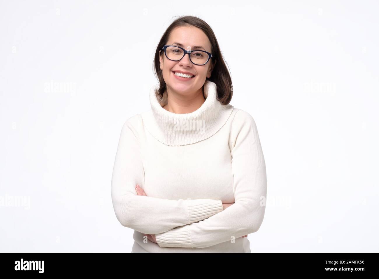 Attractive Caucaisn Mature Woman In Glasses Smiling Looking At Camera