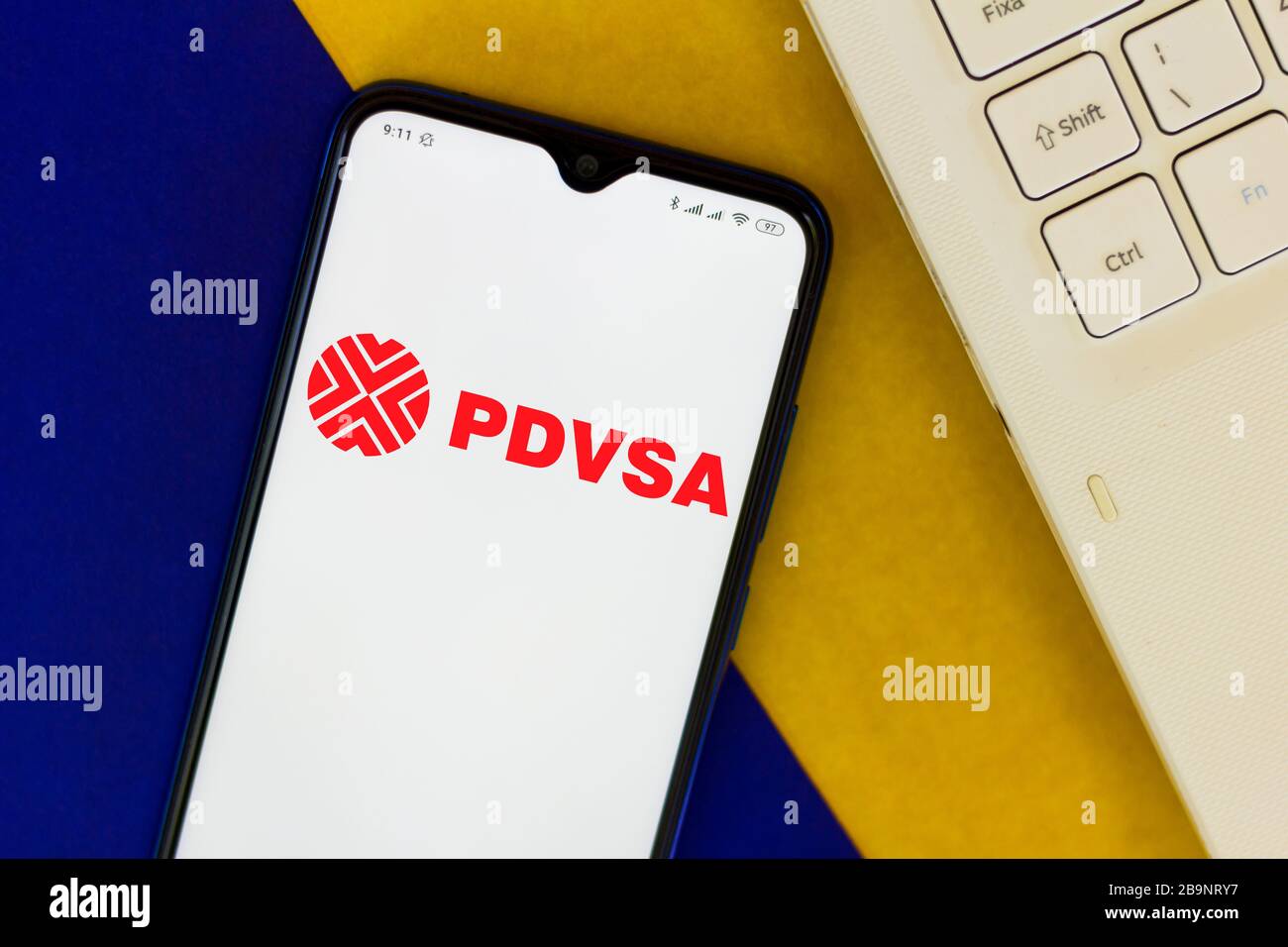 In this photo illustration a Petróleos de Venezuela PDVSA logo seen