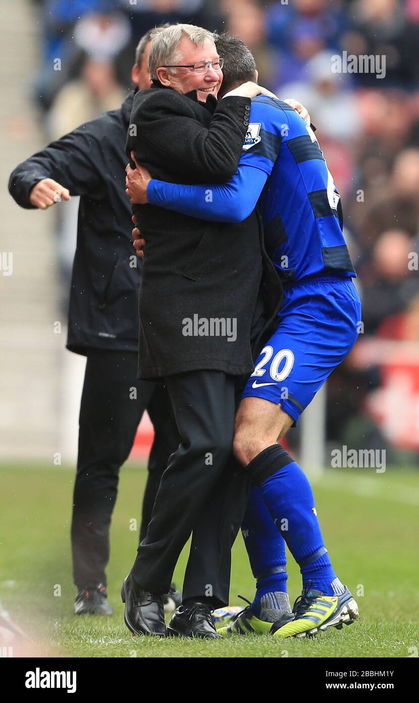 Manchester United Manager Sir Alex Ferguson Celebrates With Robin Van