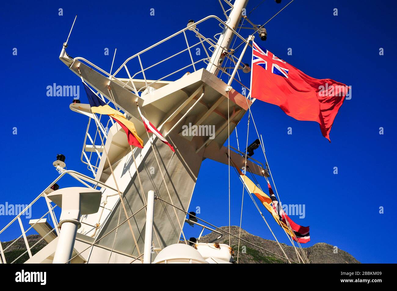 Flags Fly Atop The Mast Of A British Cruise Liner In The Norwegian