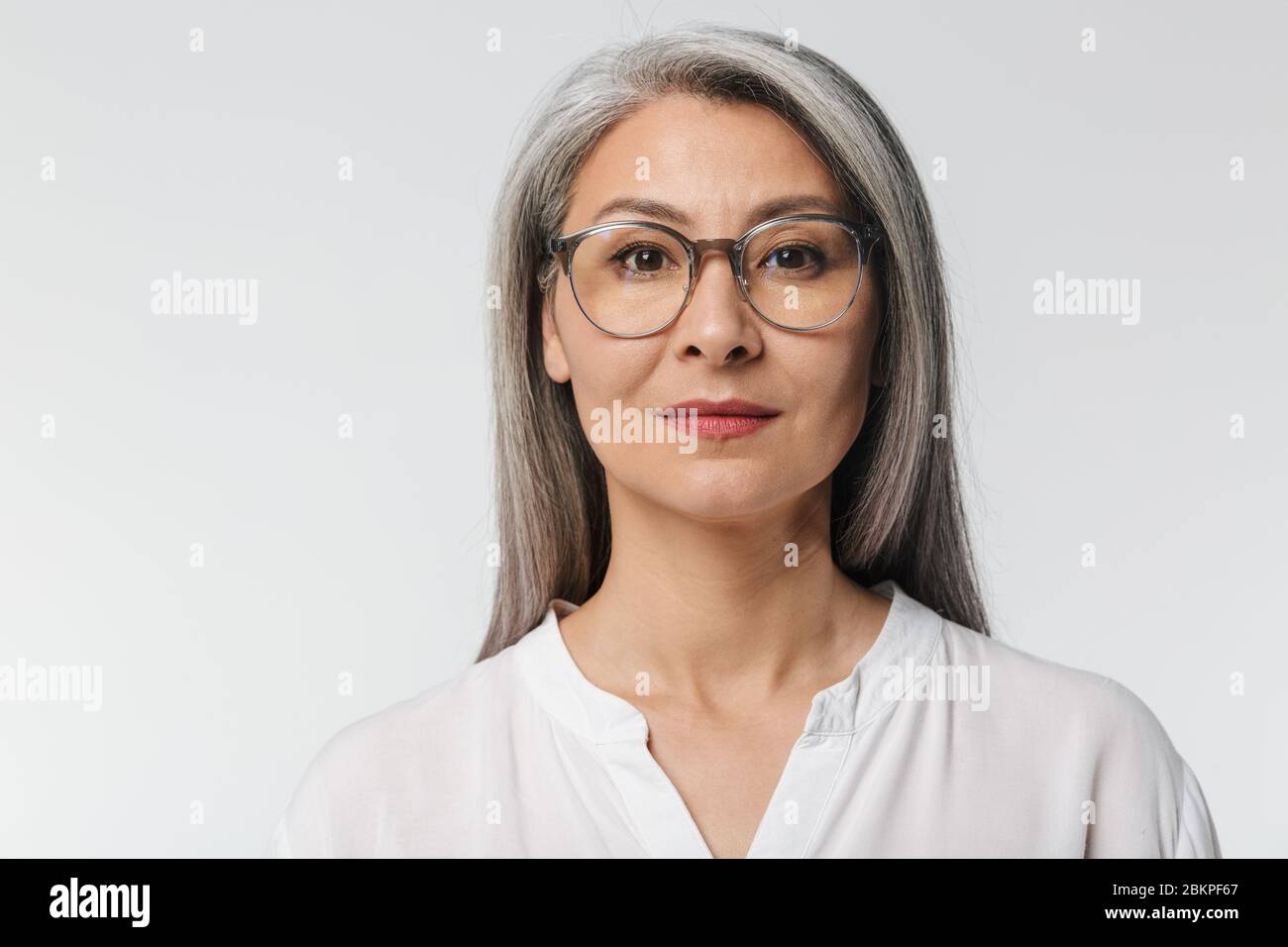 Image Of Adult Mature Woman With Long Gray Hair Wearing Eyeglasses And