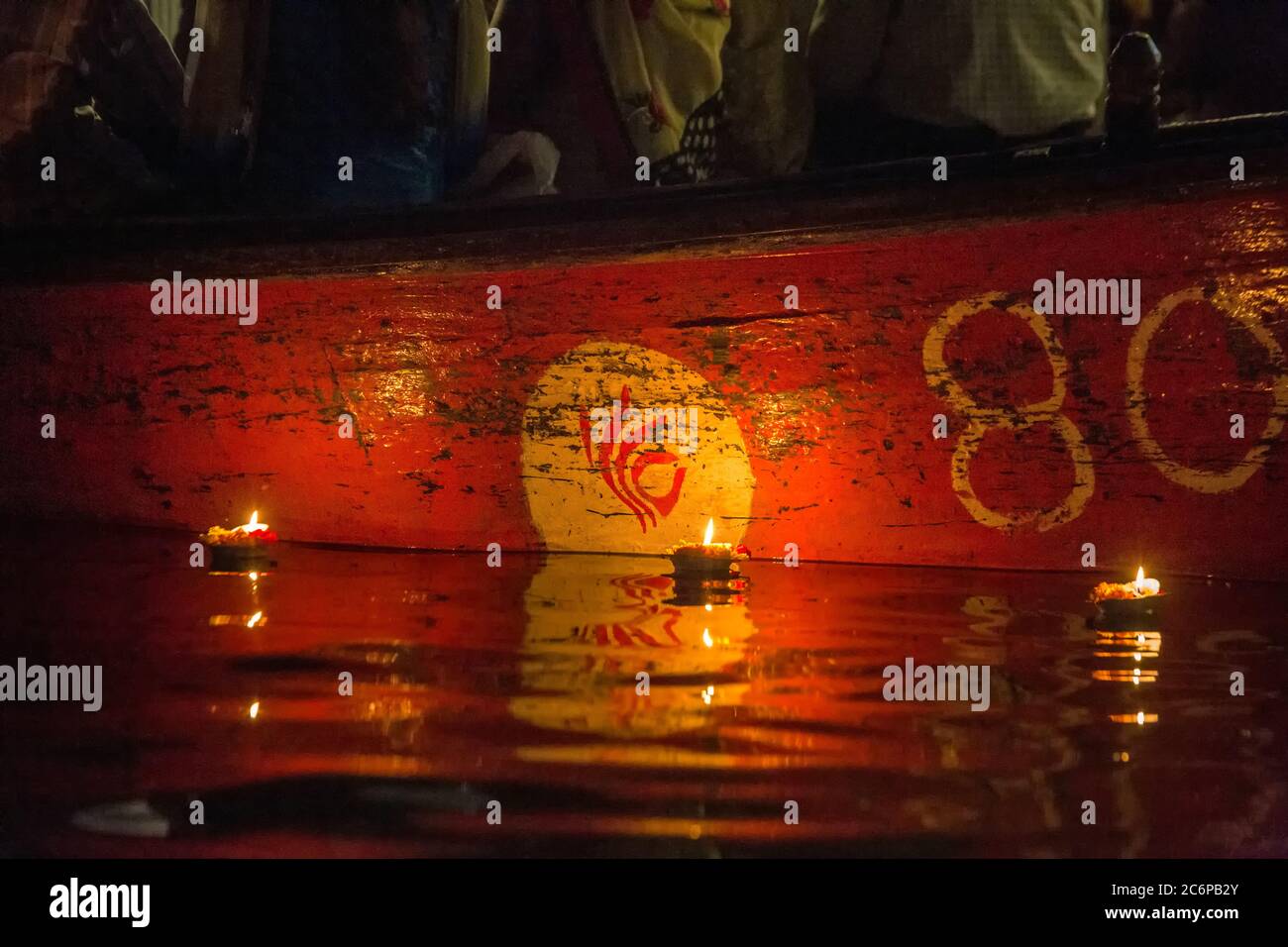 Varanasi Burning Candles Floating In The Ganges River India Stock