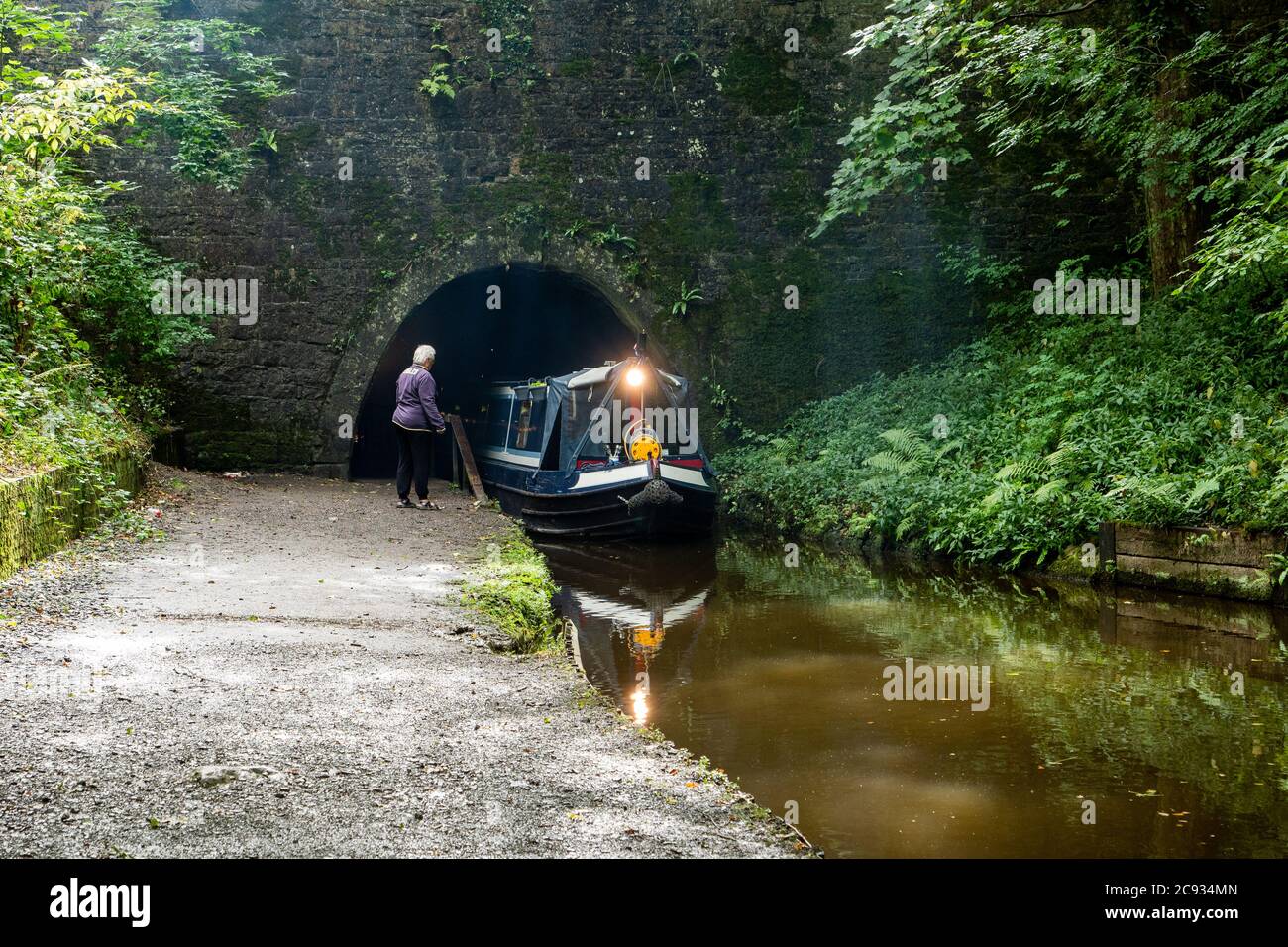 A Narrow Boat Emerges From Chirk Tunnel On The Llangollen Canal Chirk