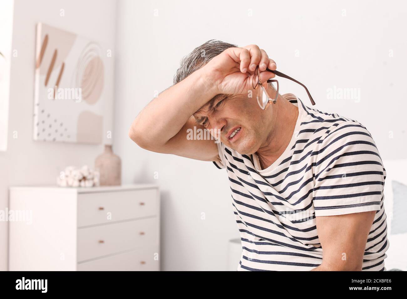 Stressed Mature Man At Home Stock Photo Alamy