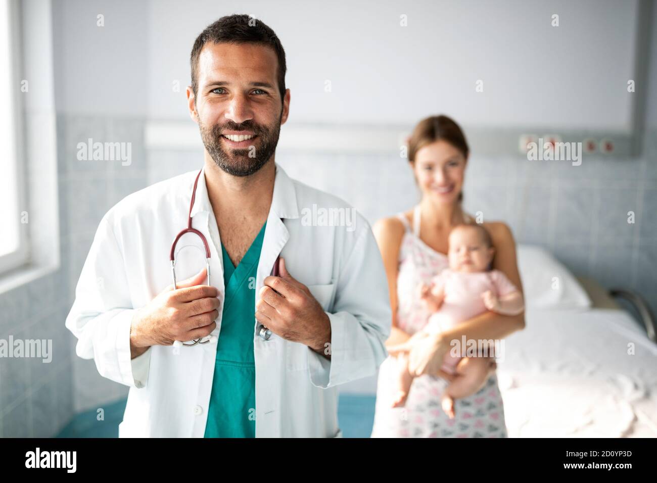 Beautiful Mother And Baby On Medical Examination With Doctor In