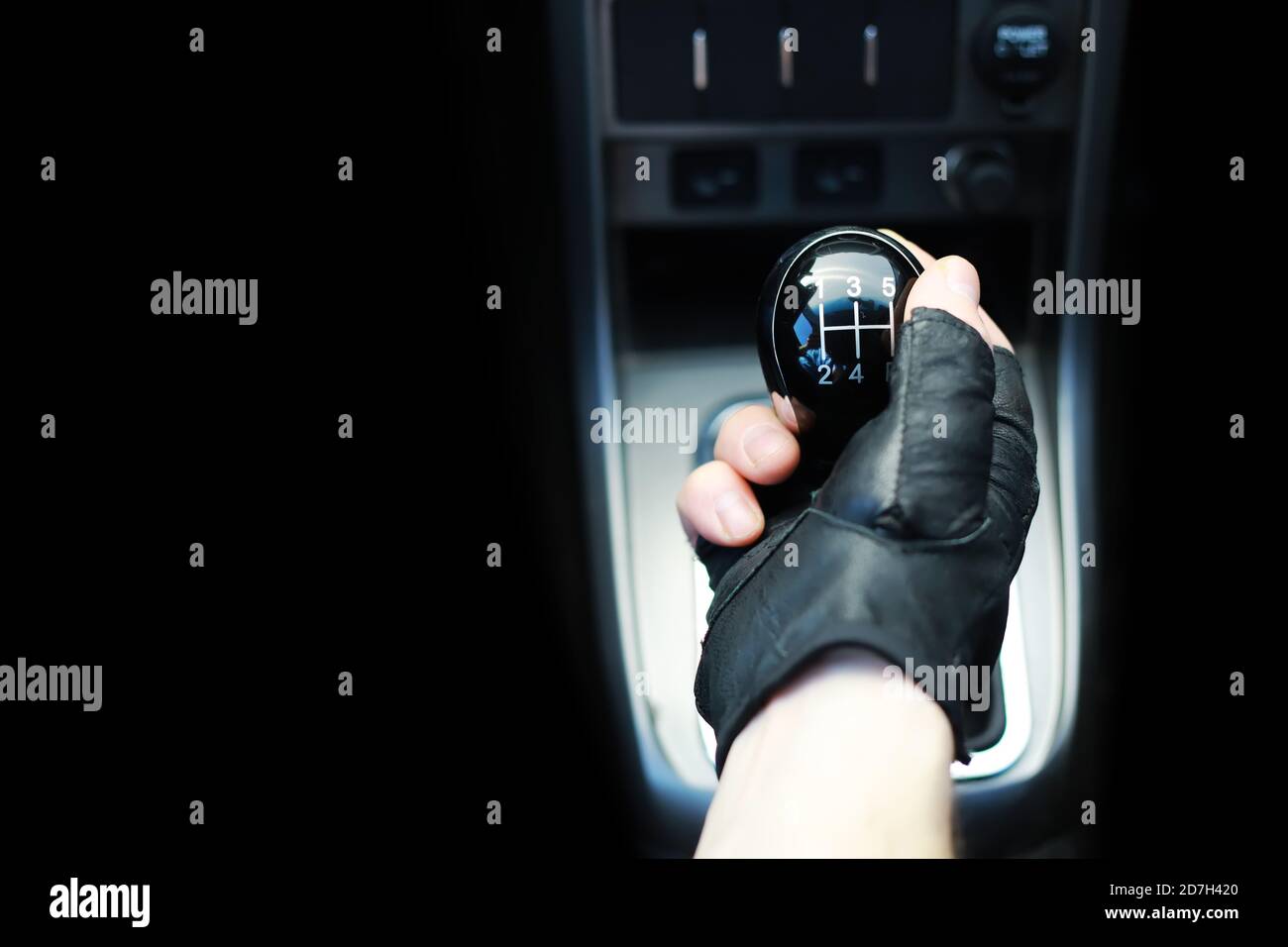 Gear Lever Manual Transmission Hand On The Gear Shift In The Car