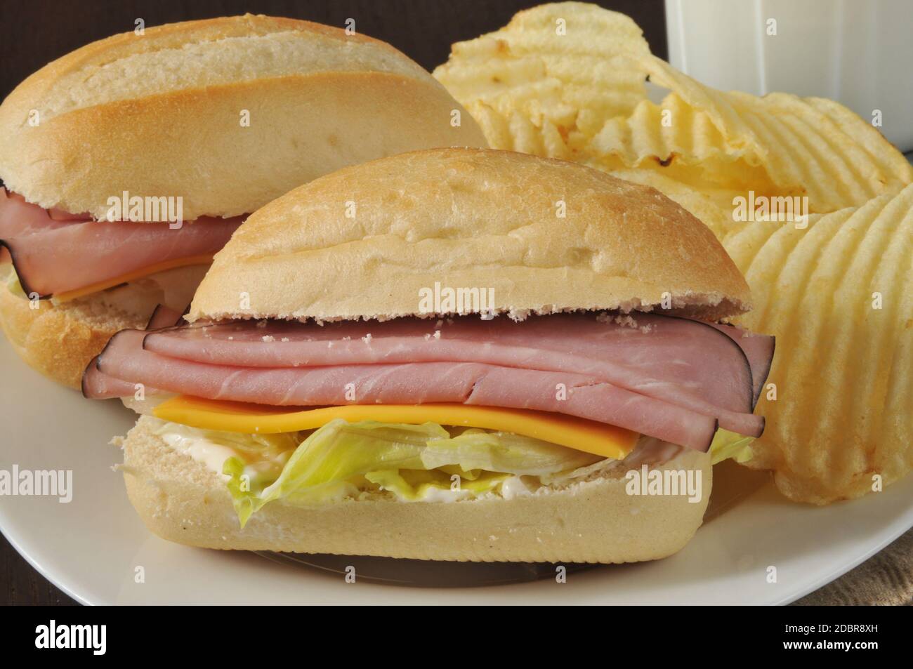 Closeup Of A Ham And Cheese Sandwich With Potato Chips Stock Photo Alamy