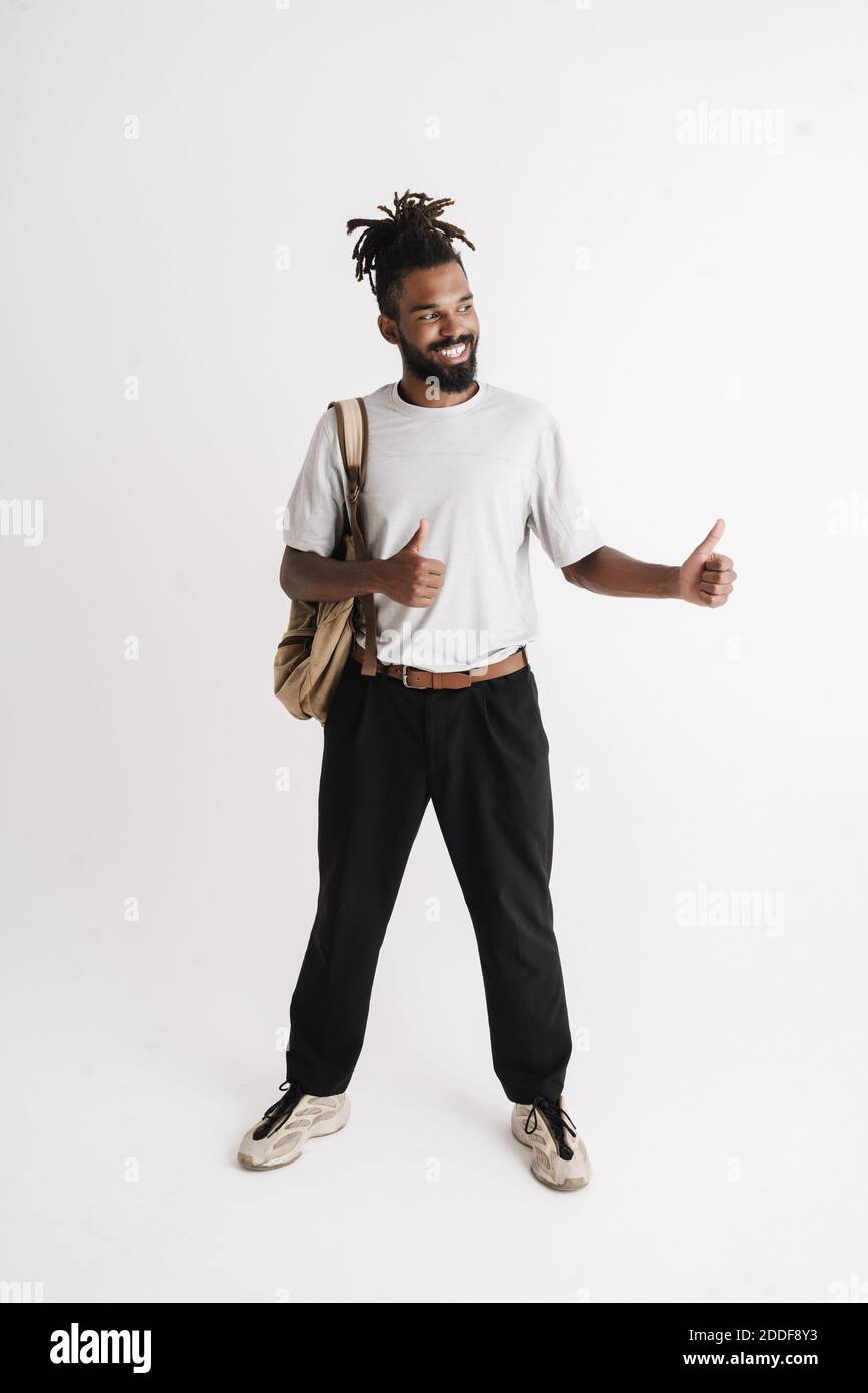 Photo Of Joyful African American Guy Showing Thumbs Up Isolated Over