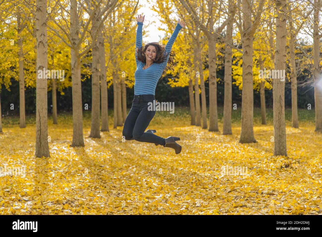 Brunette Model In Fall Foliage Stock Photo Alamy