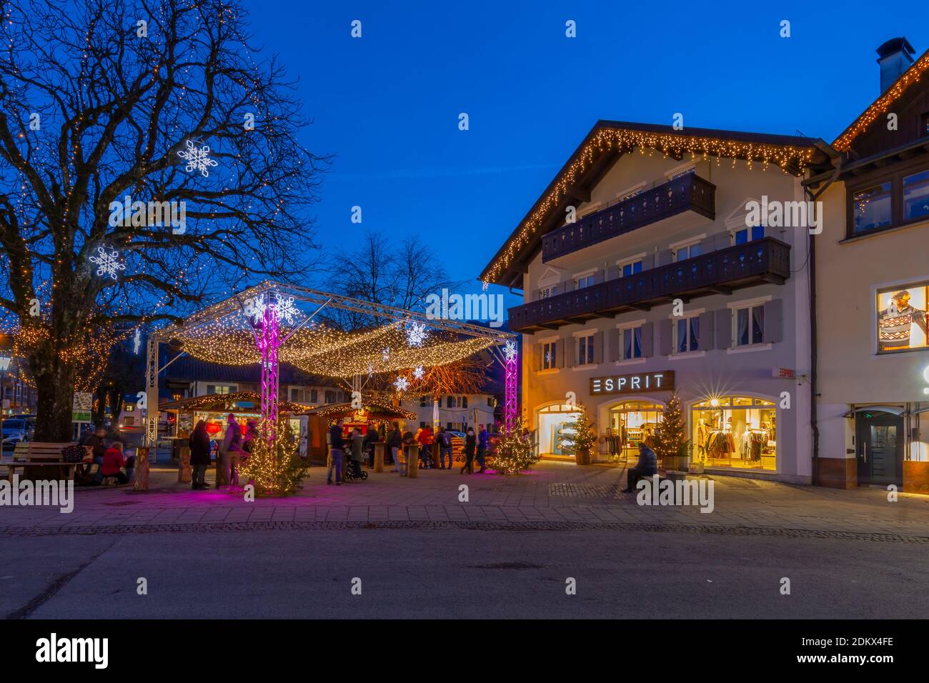 View Of Local Shops And Christmas Market Stalls At Dusk Garmisch