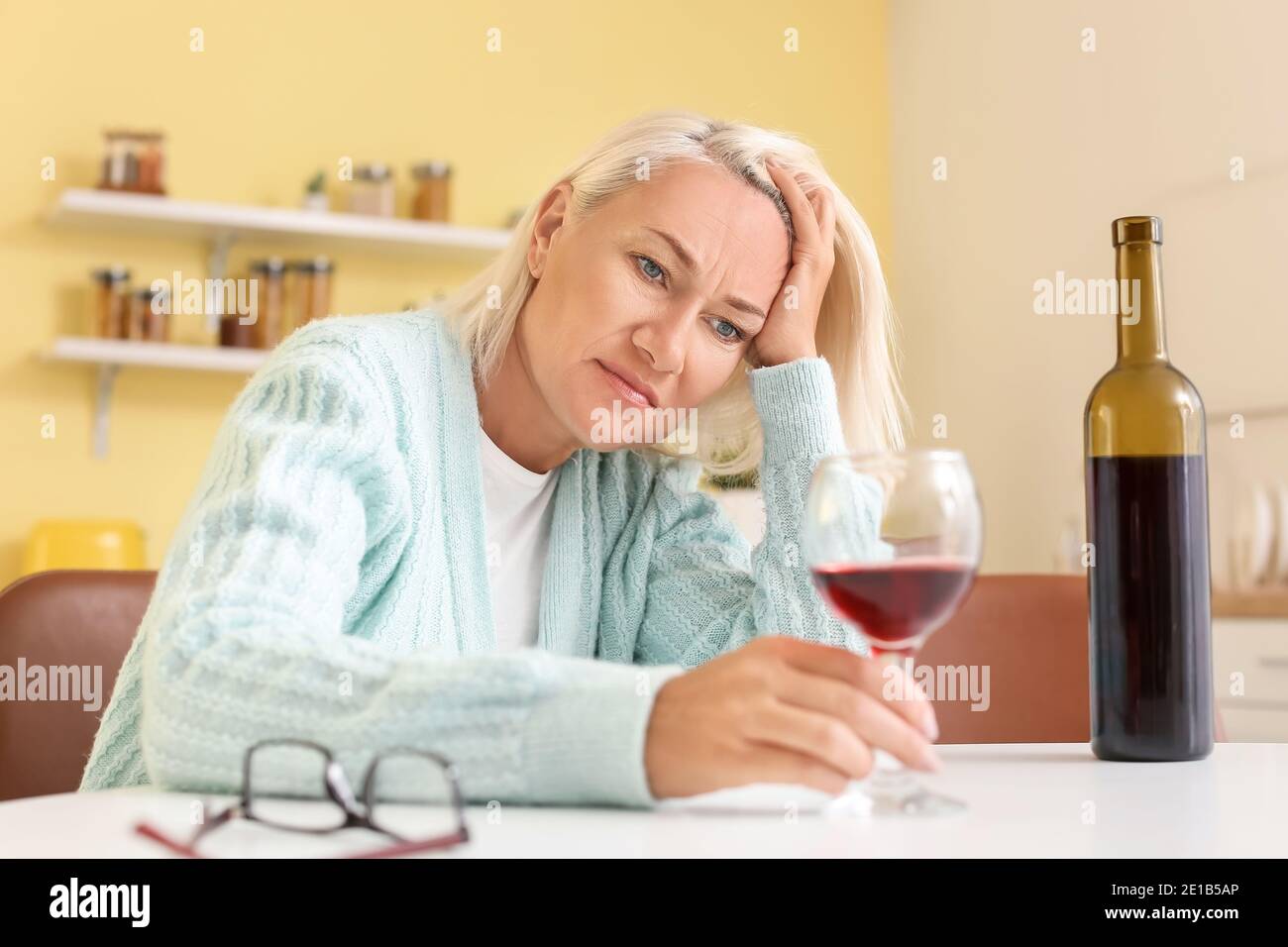 Stressed Mature Woman Drinking Wine At Home Stock Photo Alamy