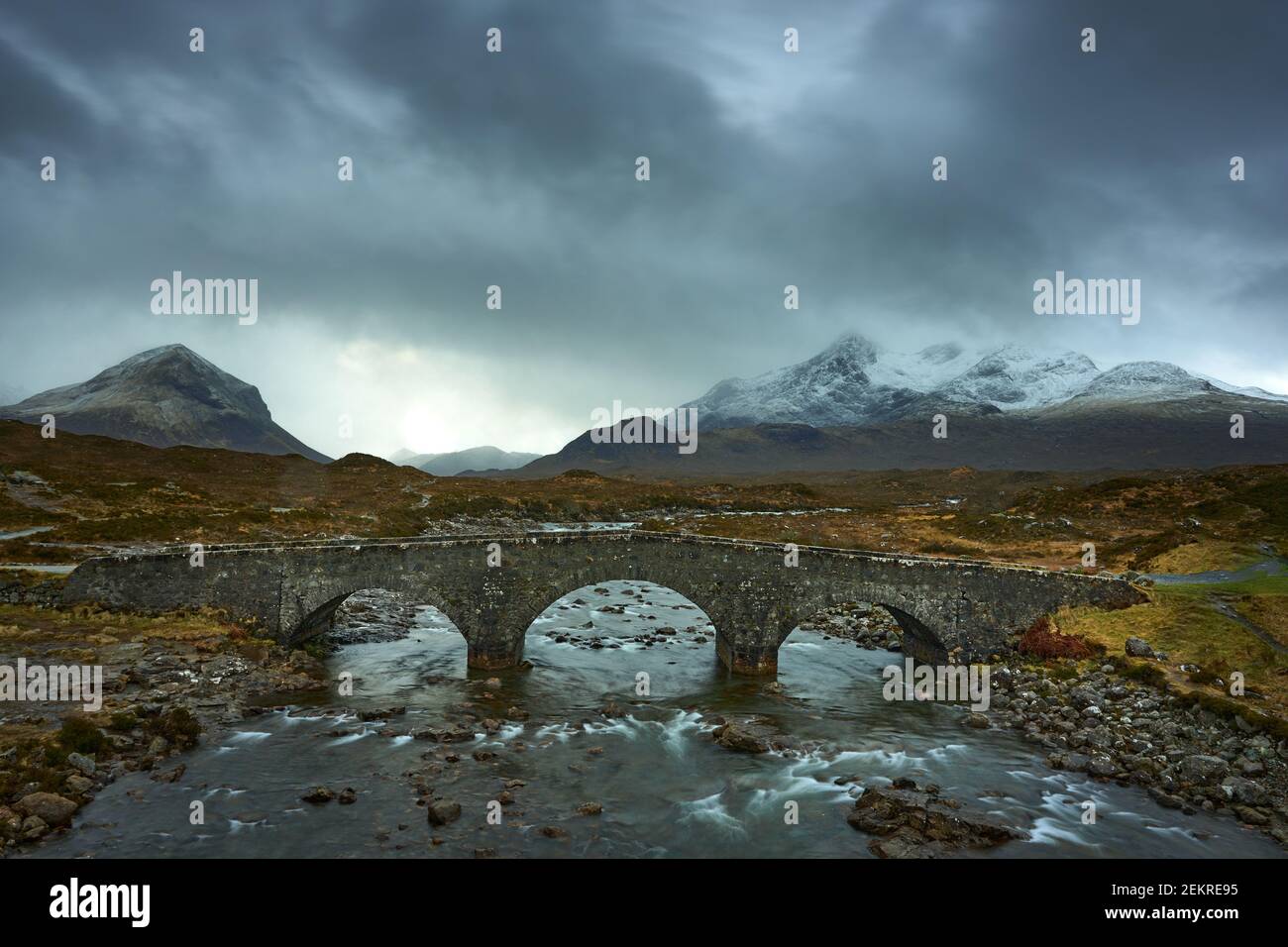 Old Three Arched Stone Bridge Over The River Sligachan In Isle Of Skye