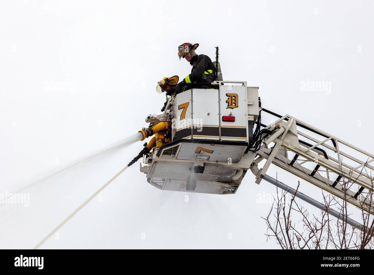 Firefighters In Tower Ladder Fighting Fire Detroit Michigan Usa By