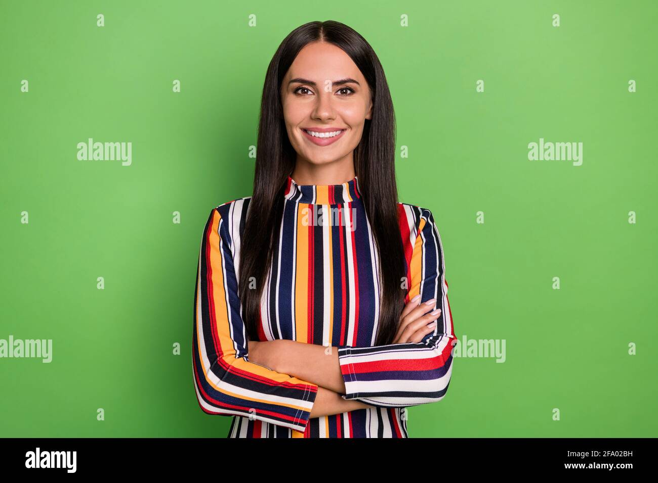 Photo Of Optimistic Brunette Lady Crossed Arms Wear Colorful Striped