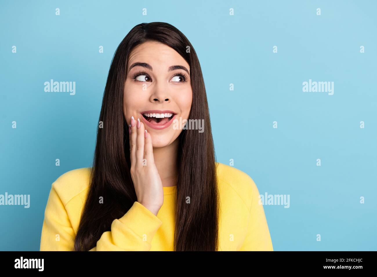 Portrait Of Nice Impressed Brunette Long Hairdo Lady Look Empty Space Wear Yellow Shirt Isolated