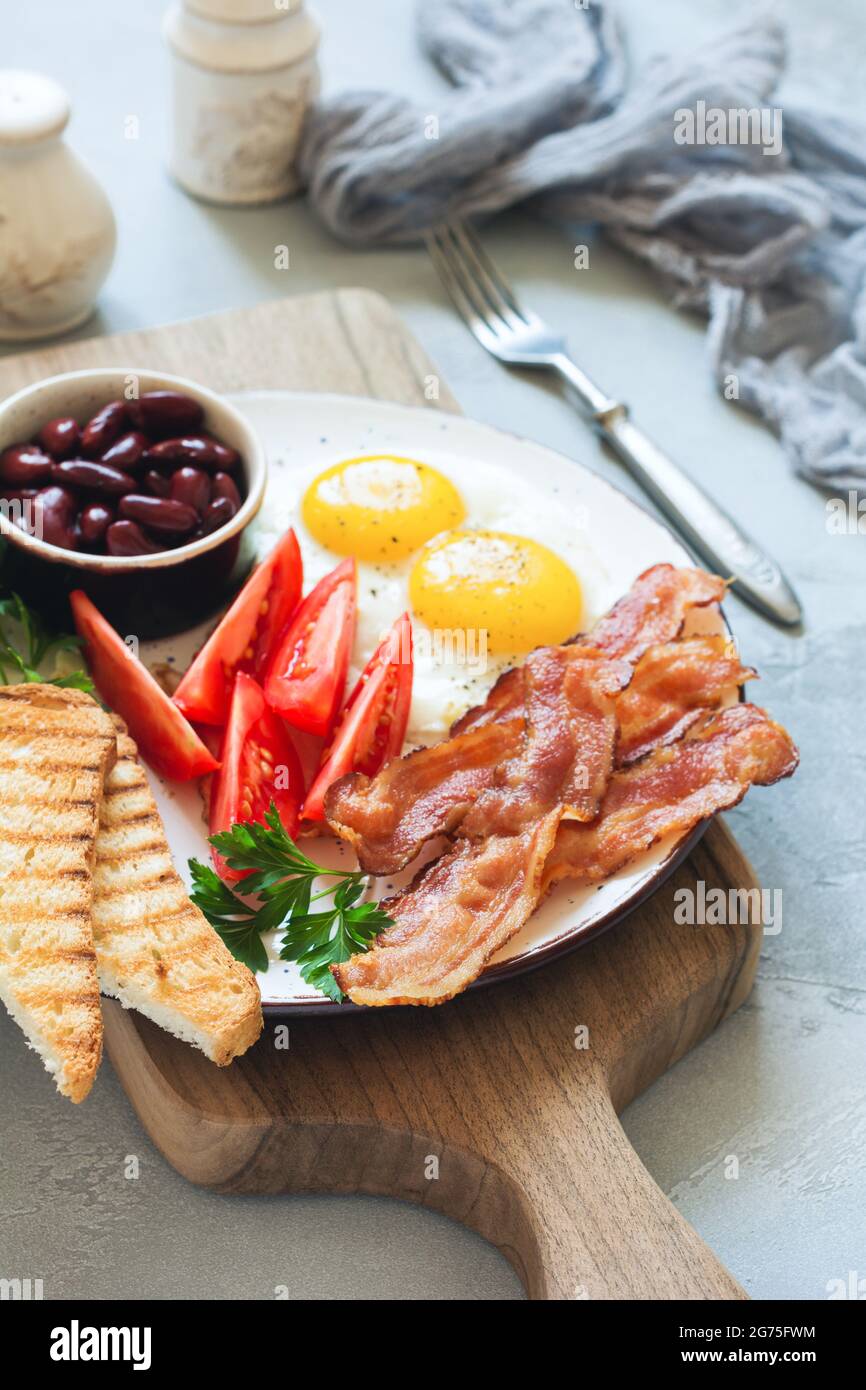 Traditional Full English Breakfast With Fried Eggs Sausages Beans