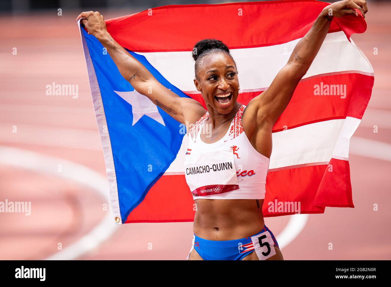 tokyo-japan-02nd-aug-2021-tokyo-japan-august-2-jasmine-camacho-quinn-of-puerto-rico-winner-of-the-gold-medal-poses-with-a-flag-after-competing-on-womens-100m-hurdles-final-during-the-tokyo-2020-olympic-games-at-the-olympic-stadium-on-august-2-2021-in-tokyo-japan-photo-by-ronald-hoogendoornorange-pictures-credit-orange-pics-bvalamy-live-news-2GB2N0R.jpg