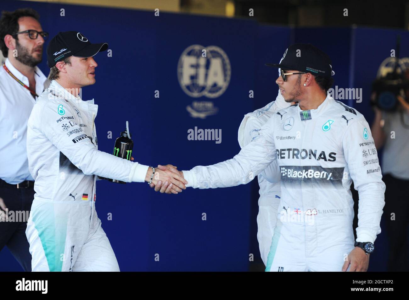 Mercedes Amg F Congratulates Team Mate Pole Sitter Lewis Hamilton Hi