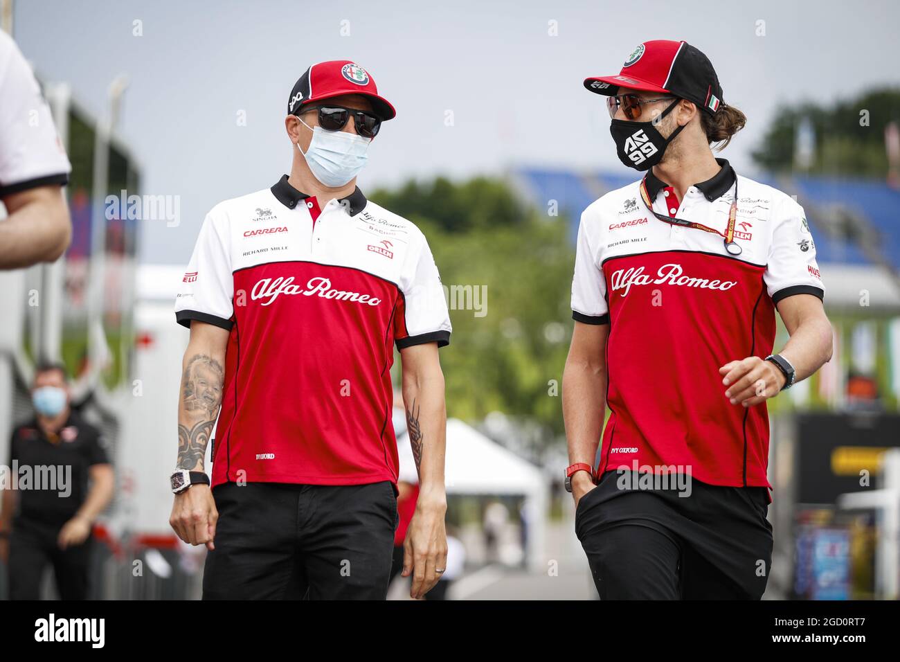 L To R Kimi Raikkonen Fin Alfa Romeo Racing With Antonio