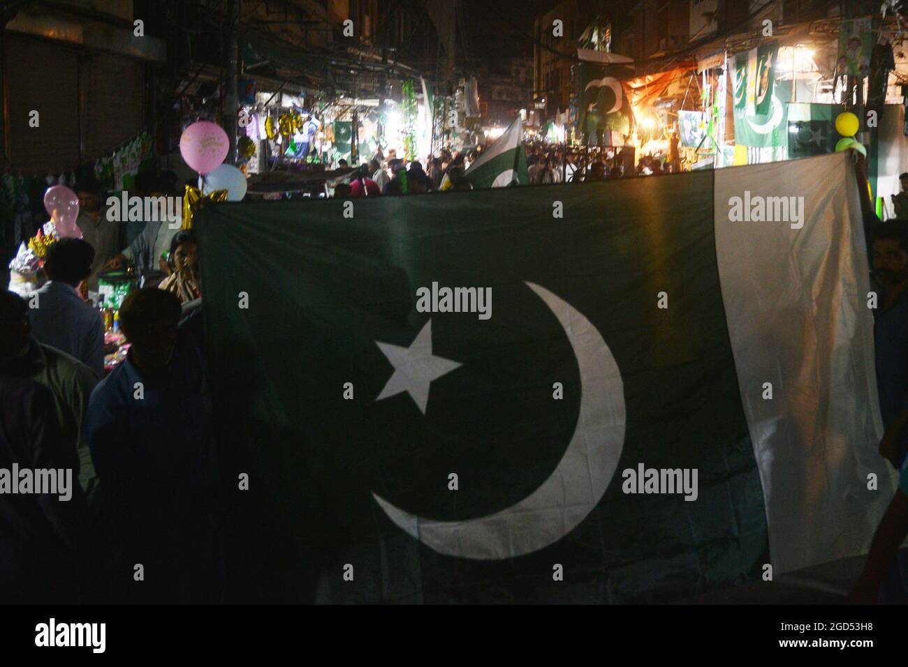 A Large Number Of Pakistani People Buying Pakistan S National Flags And