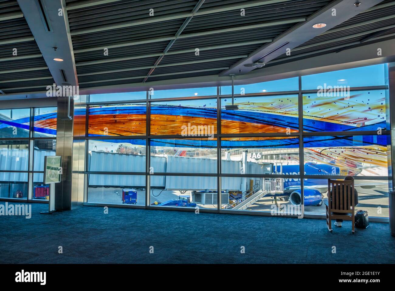 Passenger Waiting In The Terminal Concourse For Southwest Airlines At