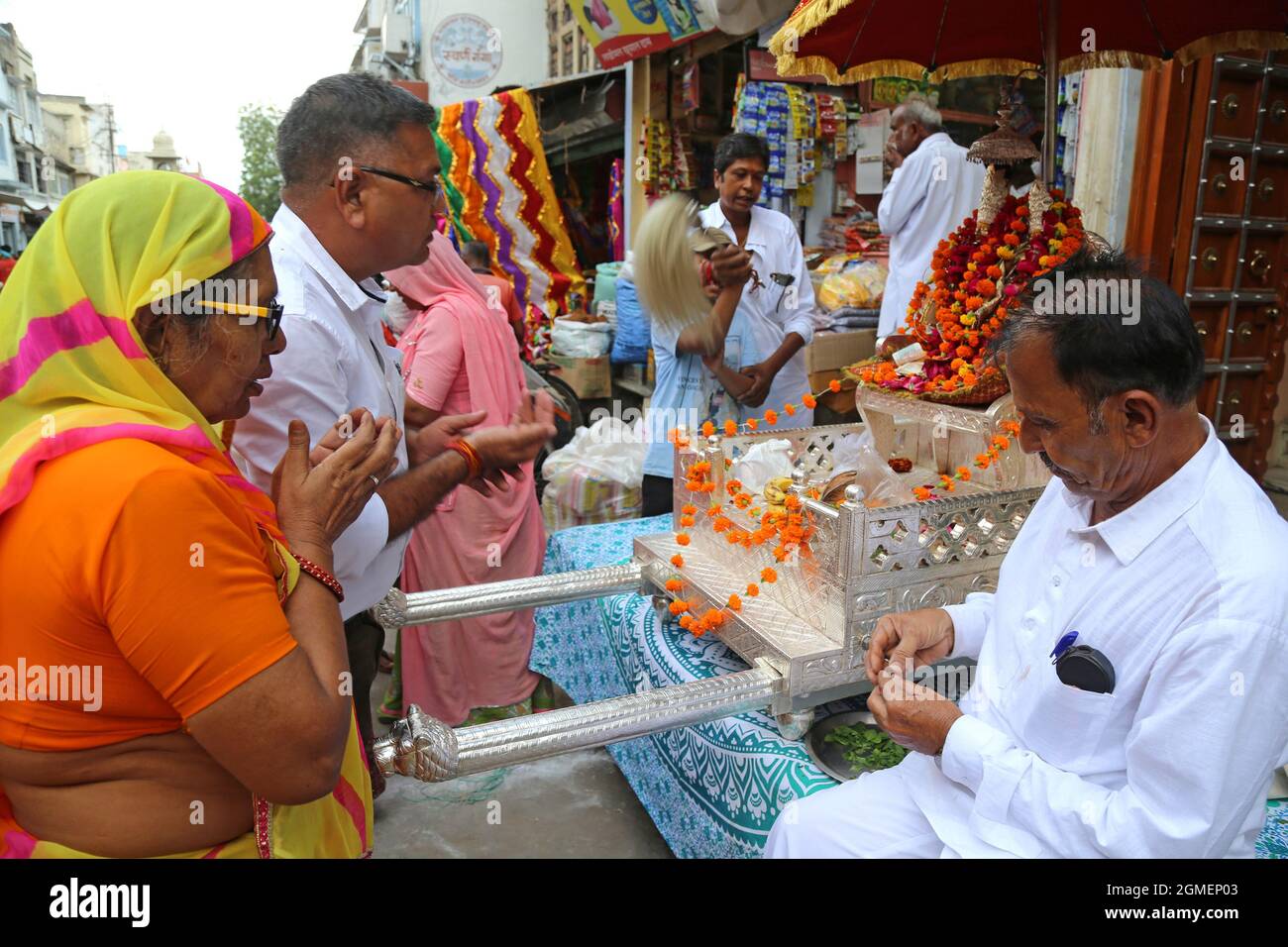 Hindu Devotees Offer Prayers To Lord Krishna And Goddess Radha At A