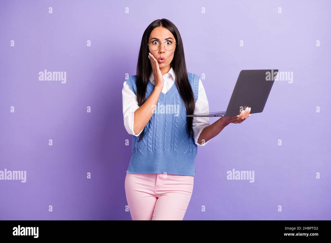 Photo Of Impressed Brunette Long Hairdo Lady Hold Laptop Wear Spectacles Shirt Vest Isolated On