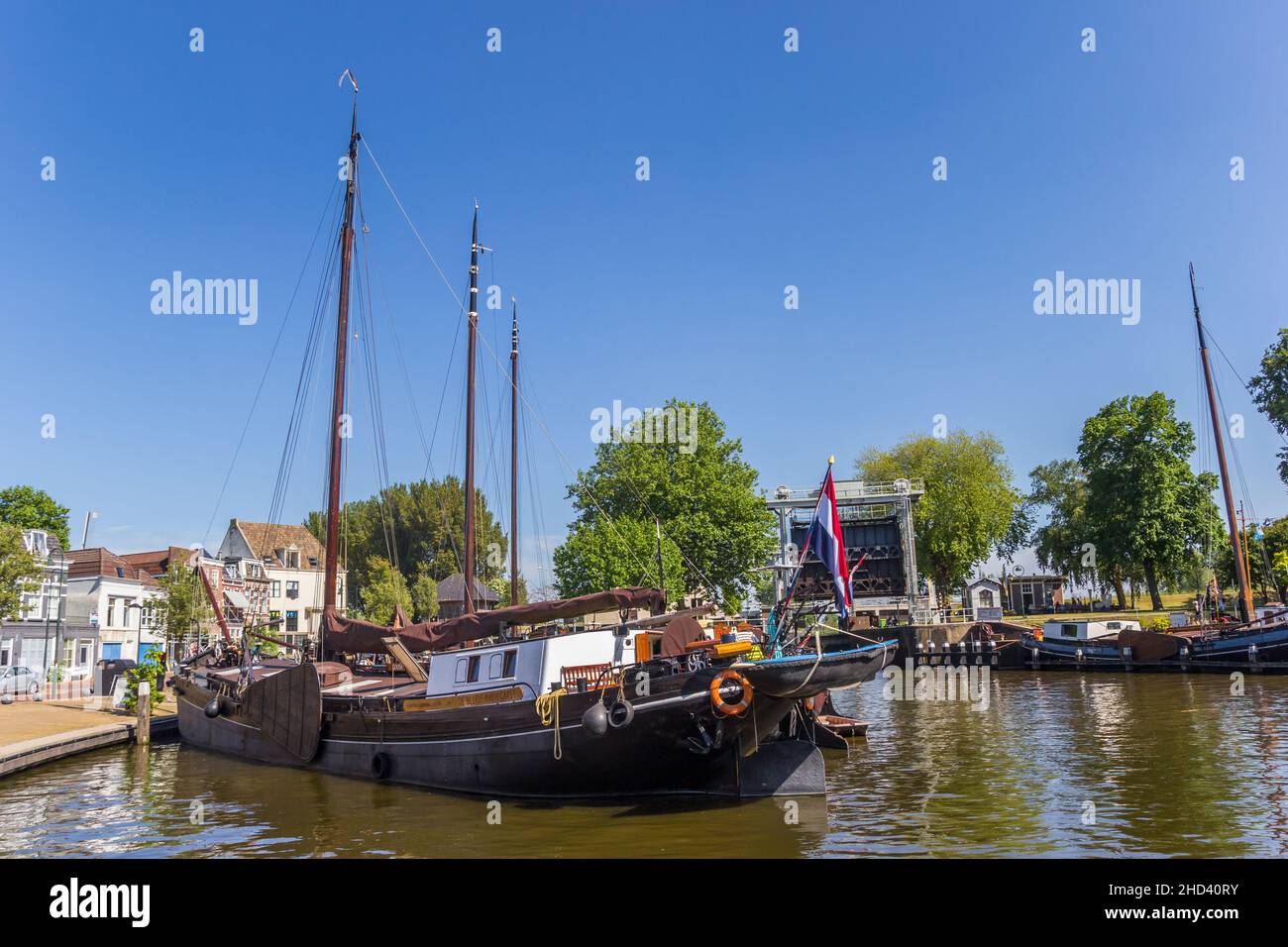 Old Wooden Sailing Ship In The Historic Harbor Of Gouda Netherlands