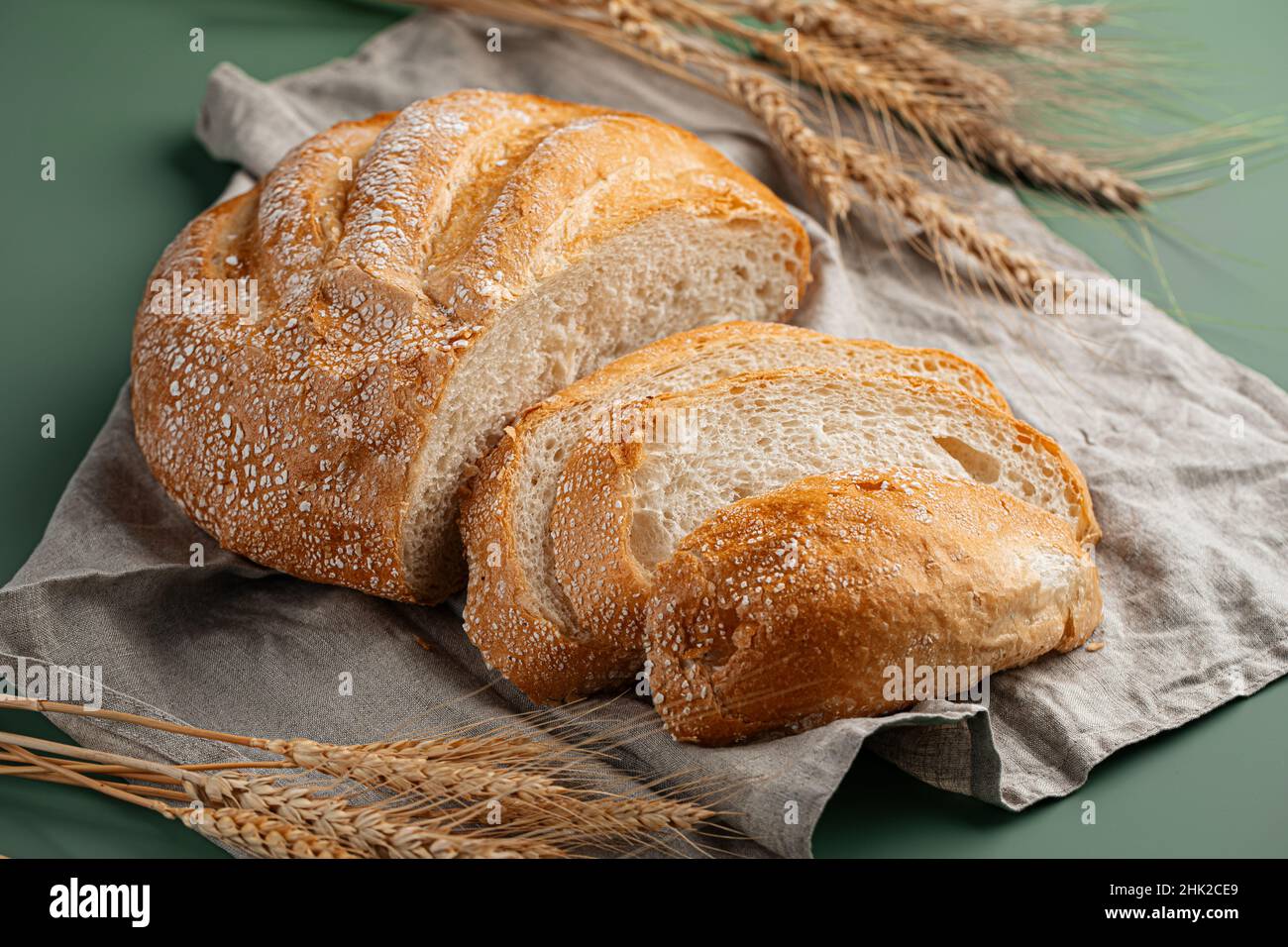 Baked Sliced Loaf Of Creamy Bread On Napkin Stock Photo Alamy