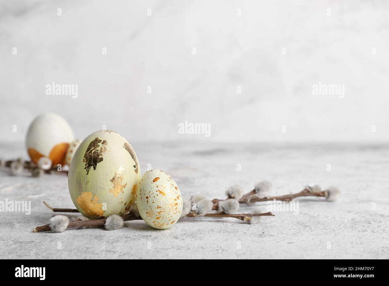 Beautiful Easter Eggs And Pussy Willow Branches On Light Background