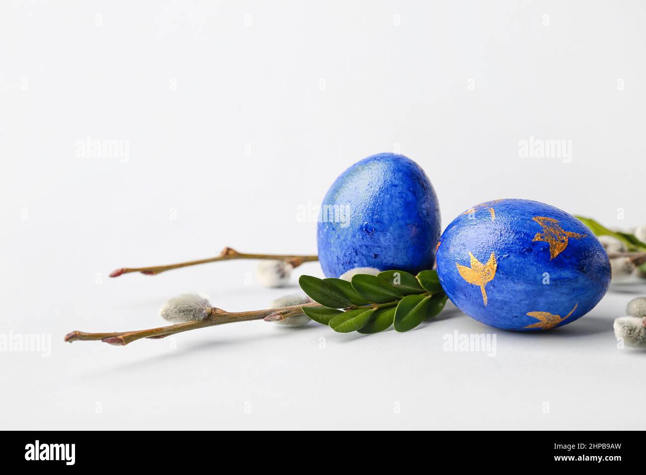 Painted Easter Eggs And Pussy Willow Branches On Light Background Stock