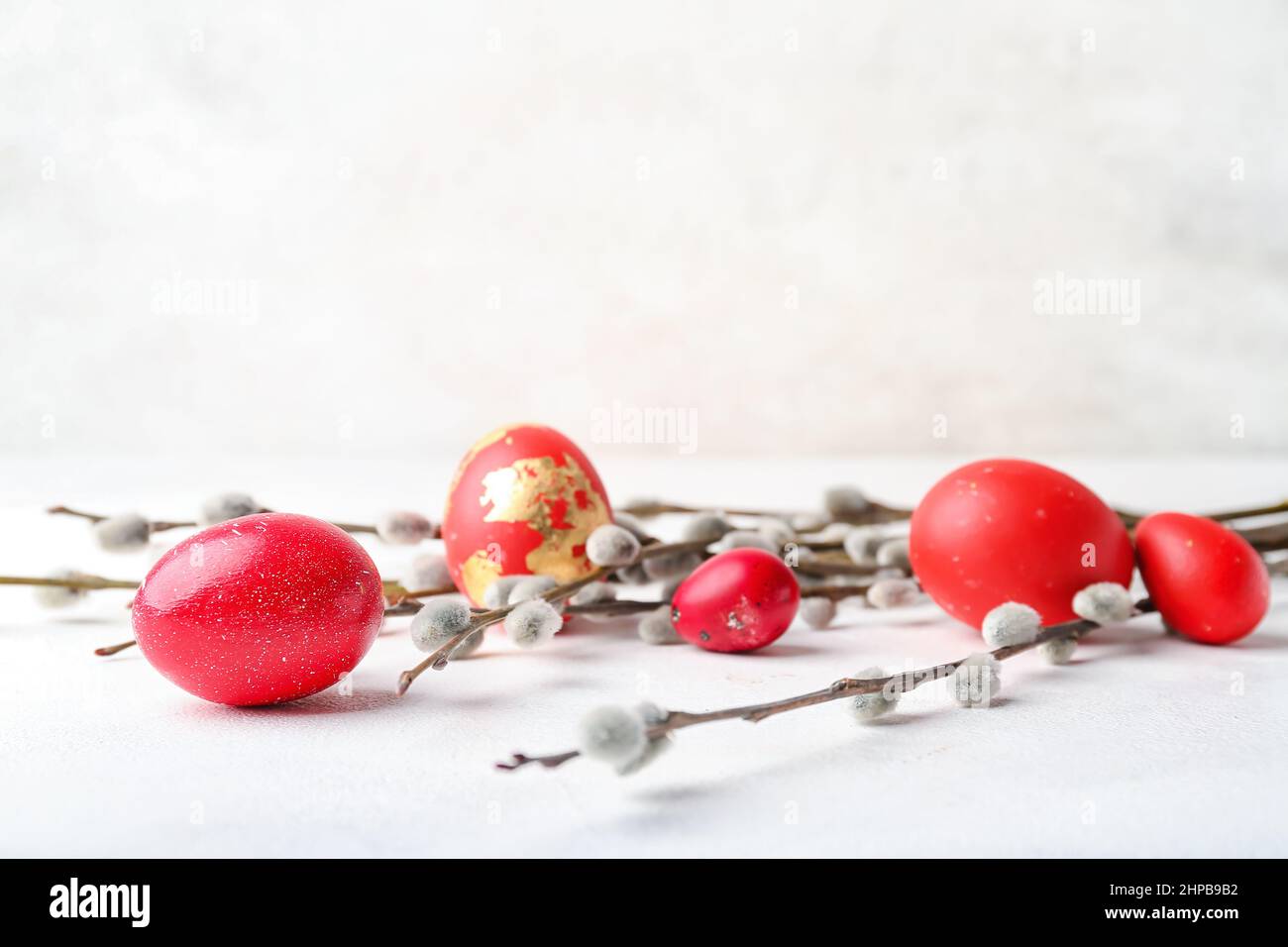 Painted Easter Eggs And Pussy Willow Branches On Light Background Stock