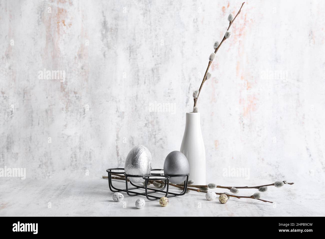 Composition With Easter Eggs And Pussy Willow Branches On Light