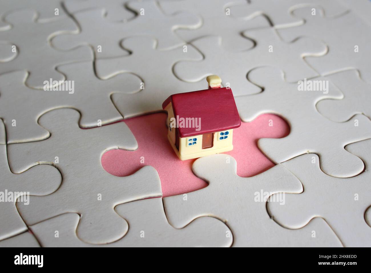 Concept Of Owning A Home Or Completing A Home Purchase Toy House And