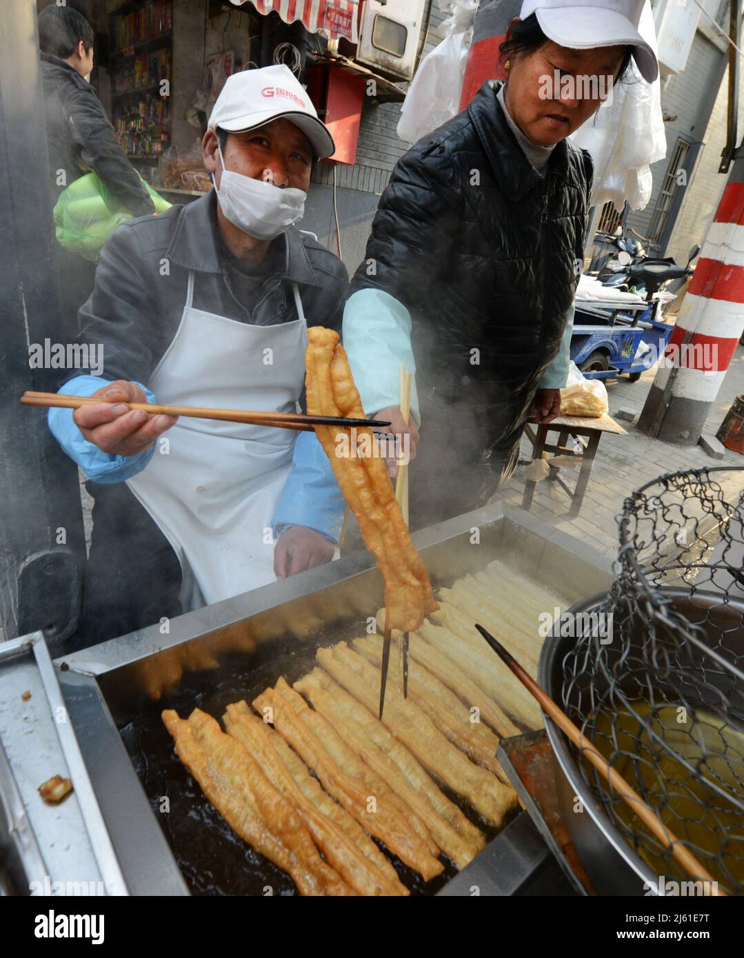 Chinese Fried Bread Youtiao Sold In Almost Every Neighborhood In