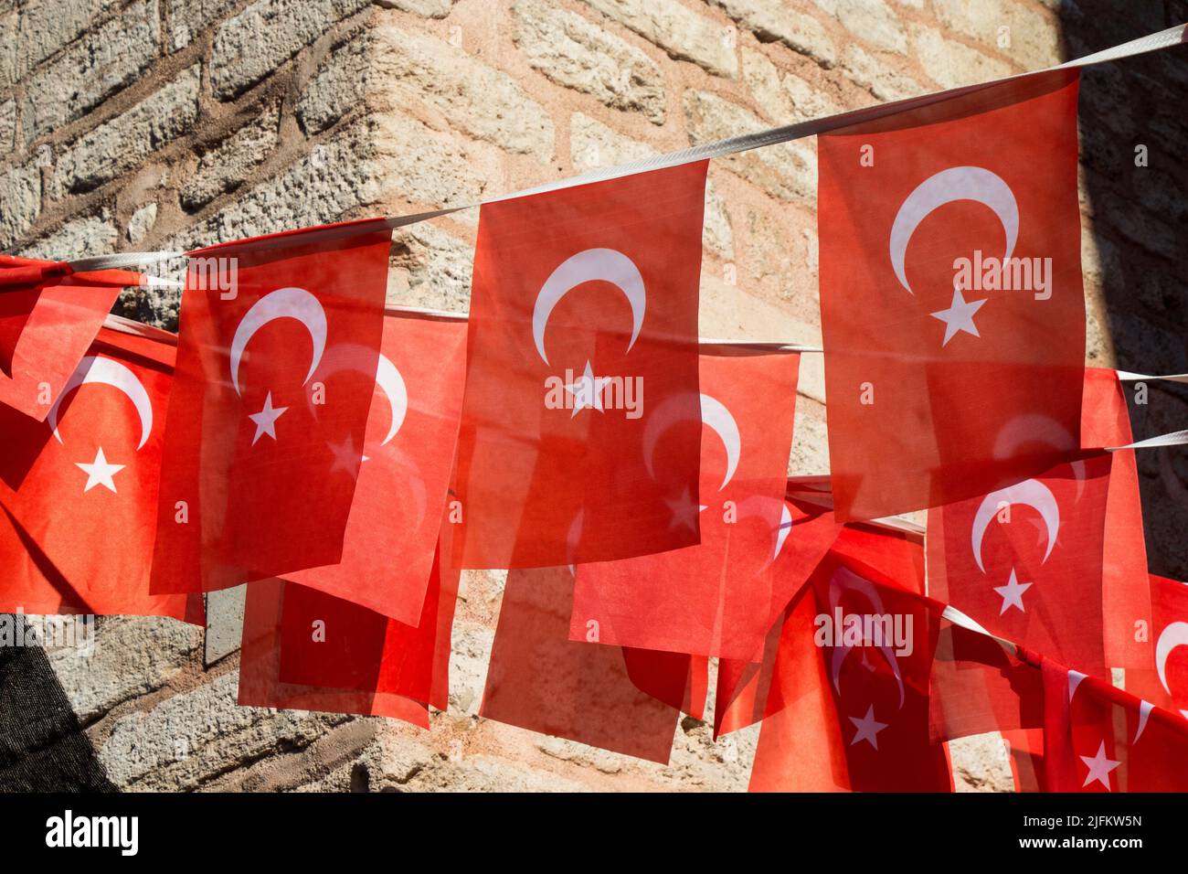 Turkish National Flag Hang On A Pole On A Rope In The Street In Open