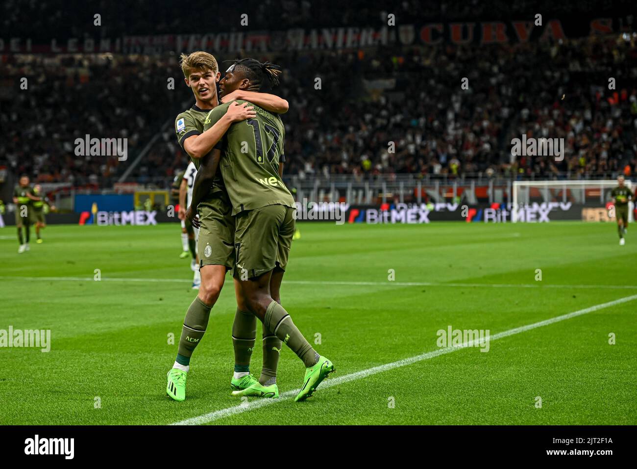 Rafael Leao Of AC Milan Celebrates With Charles De Ketelaere Of AC