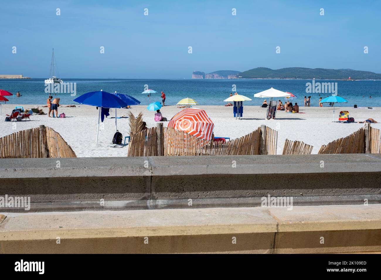 View Over The Wall Of The Spiaggia Del Lido Di Alghero Beach Near The