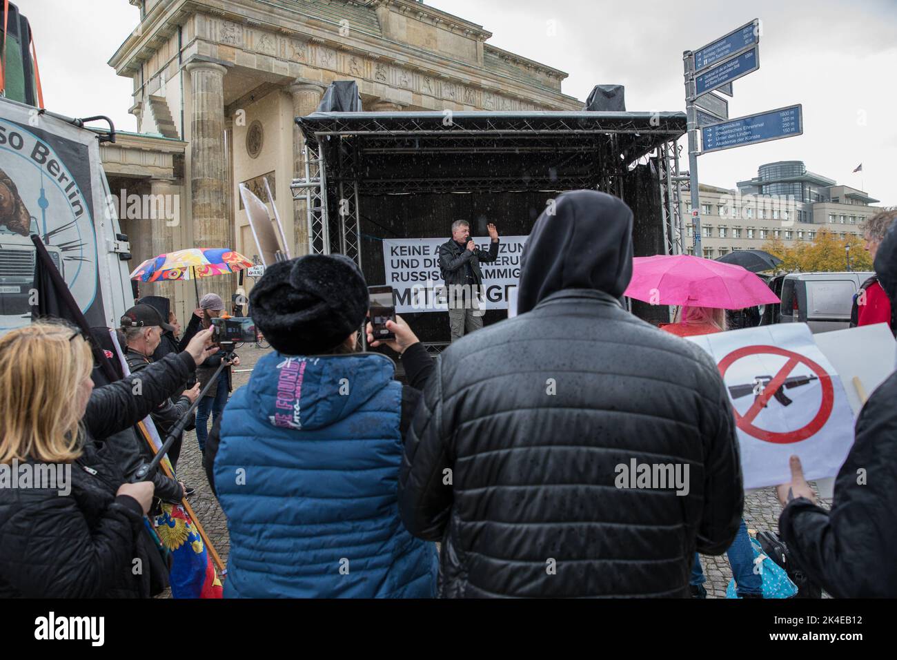 Protesters Gathered At A Rally In Front Of The Brandenburg Gate In