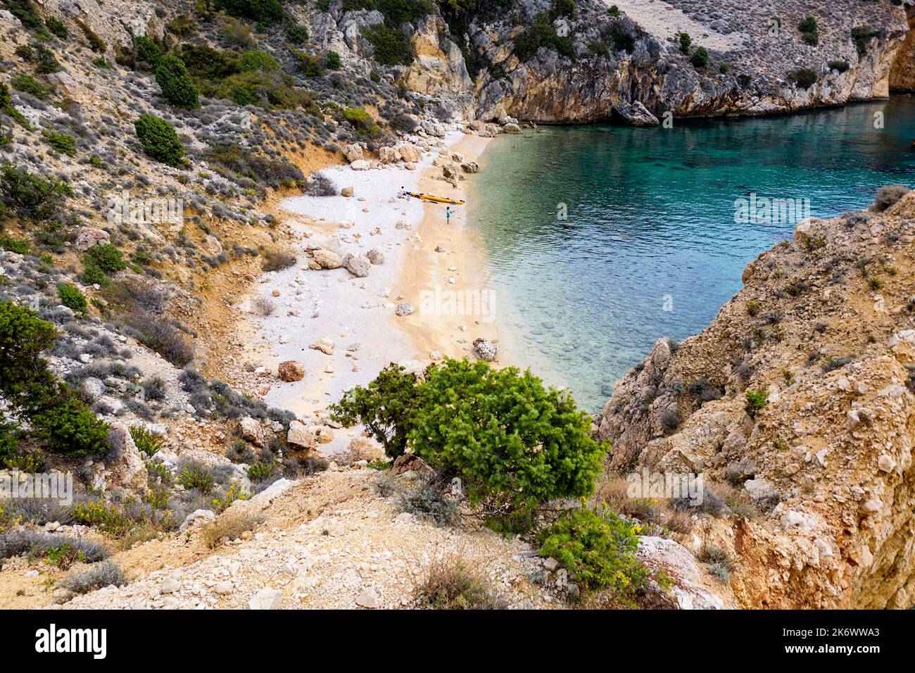 Sea Kayakers Relaxing On A Beautiful Secluded Beach Near Old Baska