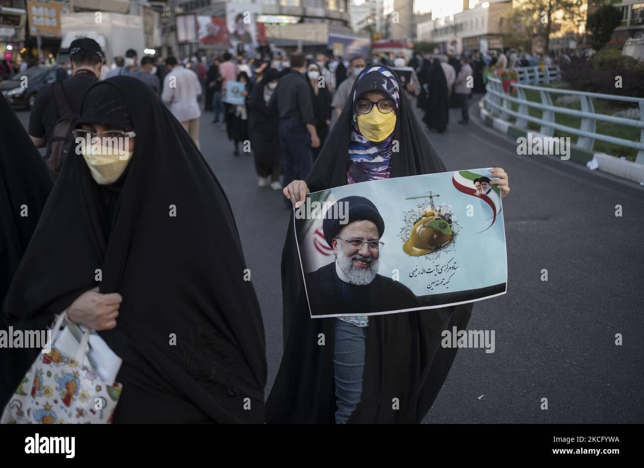 A Supporter Of Presidential Elections Candidate Ebrahim Raisi Holds An