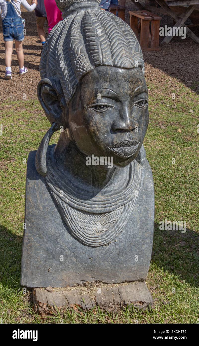 Hand Carved Statue Of Woman S Head Stock Photo Alamy